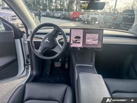 This Tesla Model Y boasts a Electric engine powering this Automatic transmission. Wireless Phone Con... (image 9)