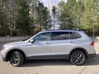 This Volkswagen Tiguan has a dependable Turbo Gas 4cyl 2.0 L engine powering this Automatic transmis... (image 9)