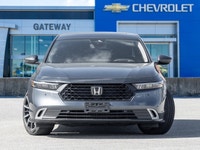 The 2024 Honda Accord Hybrid Touring commands attention in a refined Grey finish that highlights its... (image 1)