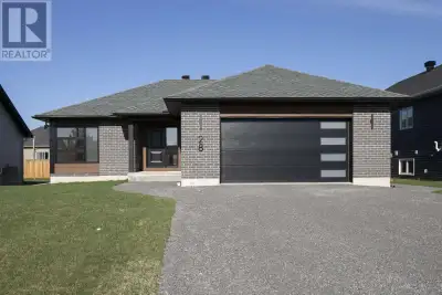 Welcome to this stunning, brand-new custom-built bungalow by Ficmar, located in the sought-after Gre...