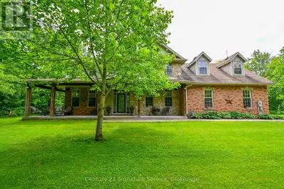 Welcome to "The Headwaters"! Nestled on 50 acres of pristine forest and 6 mile creek, this custom bu...