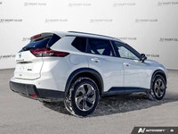The 2024 Nissan Rogue SV Moonroof, in brilliant white, offers an elevated driving experience with on... (image 6)
