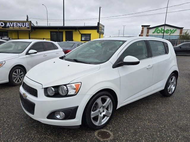 2016 Chevrolet Sonic LT - BLUETOOTH, SUNROOF, FOLDING REAR SEATS in Cars & Trucks in Calgary