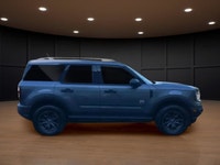 The 2023 Ford Bronco Sport Big Bend in a striking gray finish is an adventure-ready SUV with a power... (image 3)