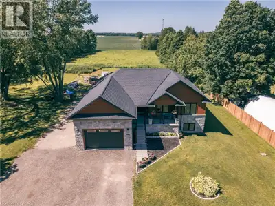 This super raised bungalow with a ground floor in-law suite/apartment could be the home for you, wit...