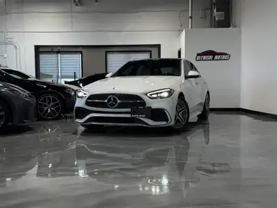 GORGEOUS WHITE EXTERIOR ON PREMIUM WHITE LEATHER INTERIOR! COMES LOADED WITH //AMG SPORT PACKAGE & M...