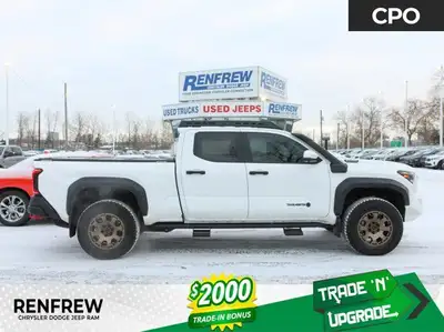 This 2024 Toyota Tacoma Hybrid Trailhunter is a one-owner, accident-free adventure truck with low ki...