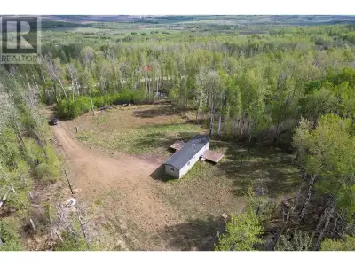 Tucked away on a serene and private 4.5-acre lot only minutes from Dawson Creek in Moore Sub. This 2...
