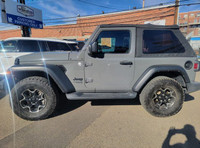 This Jeep Wrangler Sport boasts a Intercooled Turbo Premium Unleaded I-4 2.0 L/122 engine powering t... (image 3)