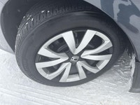 The 2024 Honda Civic Sedan LX-B CVT in sophisticated gray combines front-wheel drive with precise ha... (image 9)