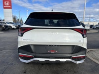 Awarded an IIHS Top Safety Pick, the 2023 Kia Sportage LX in striking Snow White Pearl ensures peace... (image 5)