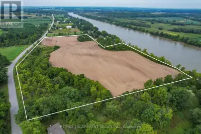 Truly Irreplaceable, Rarely offered 19.85 acre coveted Grand River Waterfront Building Lot on sought...