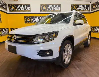 This outstanding example of a 2016 Volkswagen Tiguan Comfortline is proudly offered by Auto Avenue A...
