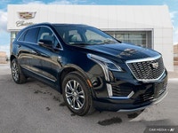The 2021 Cadillac XT5 Premium Luxury includes a panoramic roof, ventilated front seats, heated rear... (image 6)