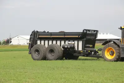 New 25 ton spreader for sale. Capacity (Heaped) 1,028 cu. ft. The spreader features slip-slide poly...
