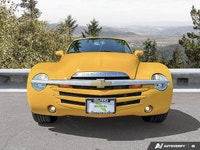 Commanding presence meets open-air freedom in this stunning Slingshot Yellow 2004 Chevrolet SSR LS,... (image 7)