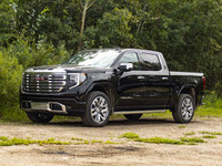 The 2025 GMC Sierra 1500 Denali blends luxury and performance in a striking, capable full-size picku... (image 2)