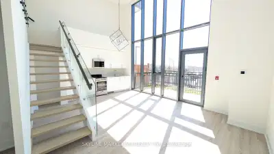 AD #3163 Extremely rare condo loft in Oakville. 18 Feet floor to ceiling windows, built in appliance...