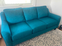 Almost new! Beautiful custom made three seater couch.