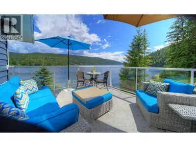Stunning property w/2.18ac & 210' shallow-bank waterfront! This is a paradise on Quesnel Lake where...