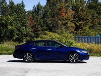 - Sunroof - Heated Seats - Heated Steering Wheel - Bose Audio - Navigation - Rear View Camera - Leat... (image 1)