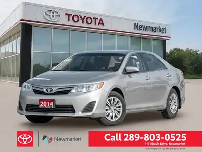 Experience the timeless elegance and smooth handling of the 2014 Toyota Camry LE in a stunning shade...