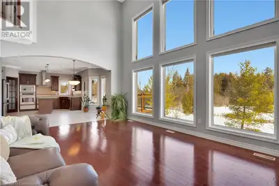 Spectacular Custom Home with Breathtaking Backyard Views Nestled in the heart of sought-after Laurel...