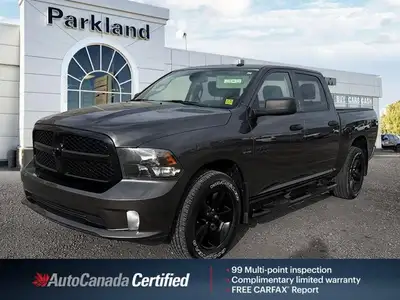 Feel the surge of a legendary *5.7L Hemi V8 engine* under your command with this striking *2023 Ram...