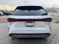 Curbside, this 2026 Lexus RX350h Premium expresses its sophisticated style with a sleek body design... (image 2)