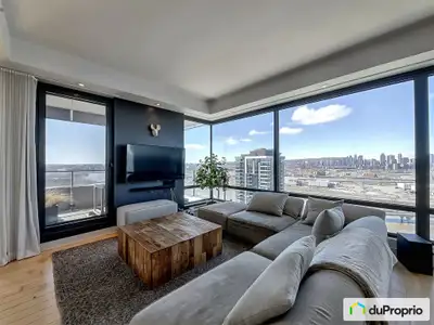 Condo de prestige au 25e étage. Vue spectaculaire sur Montréal et le fleuve. Vivez en hauteur et en...
