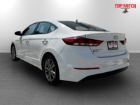 a practical compact sedan known for its reliability and value. It features a fuel-efficient 2.0L eng... (image 5)
