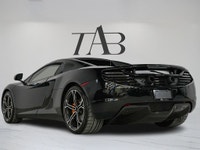 The 2014 McLaren MP4-12C Spider is a stunning blend of cutting-edge technology. This local Ontario v... (image 4)