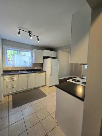 3 bedroom 1.5 bathroom, 3 level unit within an 8 unit building. The main floor has a large living ro...