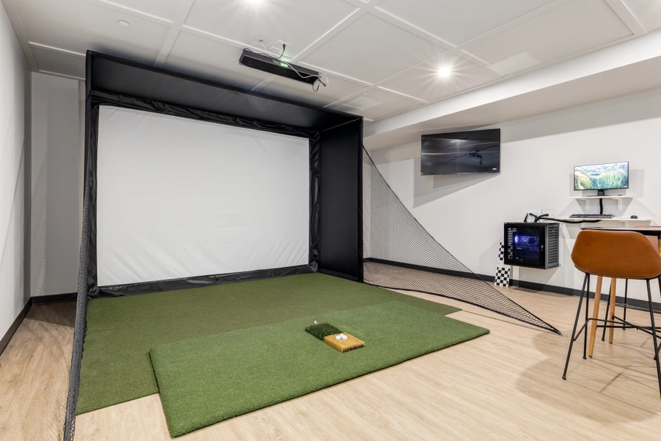 Fully-loaded gym, golf simulator, games room, coworking space, a 4