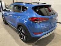 Le Hyundai Tucson 2017 LIMITED 1.6L TURBO AWD CUIR TOIT PANO CAMERA RECUL proposé chez AutoStudio 72... (image 1)