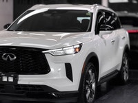 The 2023 INFINITI QX60 LUXE is a premium three-row SUV that balances family utility with high-end Ja... (image 2)