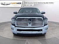Experience the robust power and commanding presence of the 2012 Ram 3500 Laramie with its stunning d... (image 4)