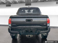 Experience proven reliability and rugged capability with the *2021 Toyota Tacoma*, featuring *143,96... (image 4)