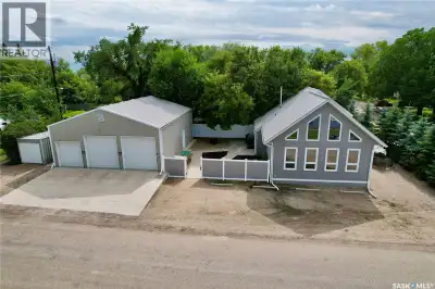 Welcome to a 1 and a half storey home with Dream Shop(34'x40') Corner Lot at 212 Jura St in Colonsay...