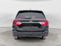This 2020 Honda Odyssey EX-L finished in a sleek black exterior with a matching black leather interi... (image 3)
