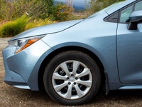 The 2020 Toyota Corolla LE, with its stunning blue exterior and efficient front-wheel drive, offers... (image 5)