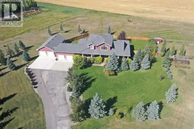 Welcome to a beautifully maintained acreage within Fort Macleod town limits.This impressive property...