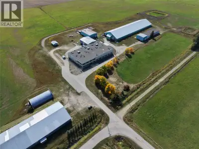 97.55 Acre Agri-Industrial Opportunity on the Creston Flats This property combines productive farmla...