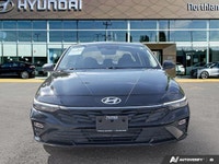 This 2024 Hyundai Elantra Essential shines with its sleek Abyss Black exterior and practical feature... (image 7)