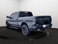 This Ram 1500 Classic has a powerful Regular Unleaded V-8 5.7 L/345 engine powering this Automatic t... (image 3)