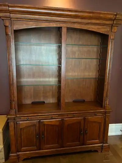 Beautiful collection of solid wood furniture and leather ottomans for sale. All pieces are well-buil...