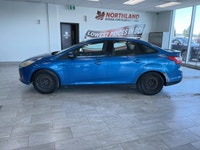The 2014 Ford Focus SE is a fuel-efficient and compact sedan that's perfect for daily commuting and... (image 1)