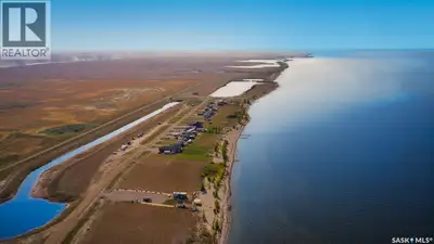 Canal lot for sale in Sunset Acres Resort on the East shore of Last Mountain Lake. This waterfront l...