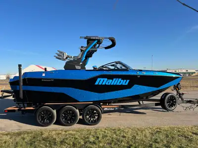 Pre-Owned 2025 Malibu M230. Monsoon M6Di 6.2L Only 23 Hours. Tri-Axle Malibu Boats Trailer. The all-...