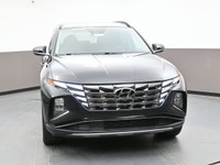 The Hyundai Tucson Hybrid combines bold styling with outstanding fuel efficiency and smooth, quiet p... (image 2)